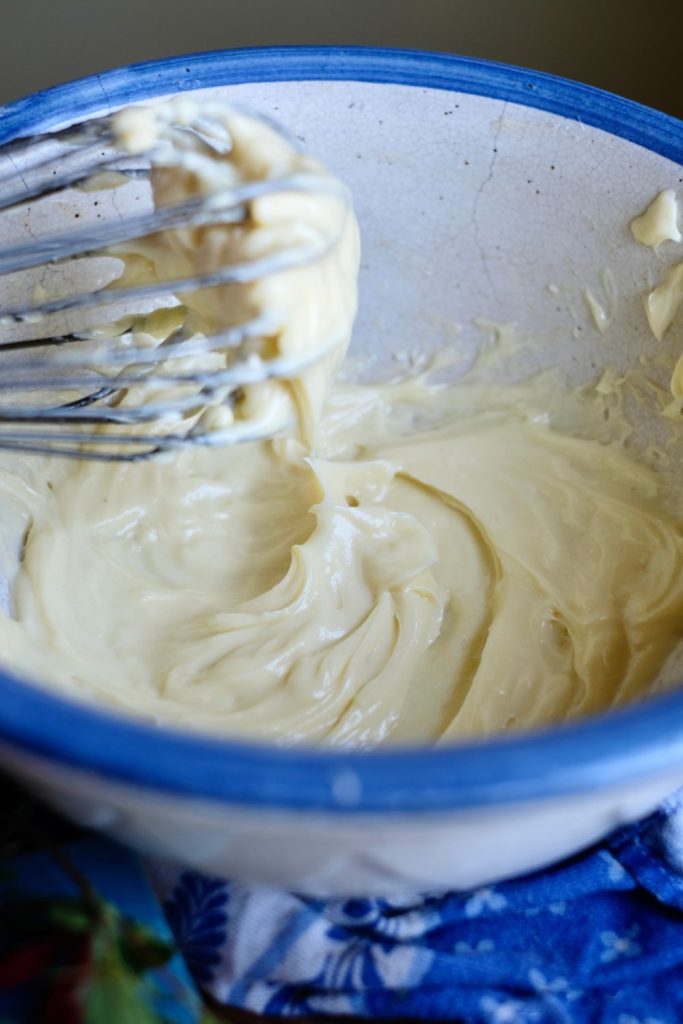 Emulsifying the mayo with a whisk and bowl