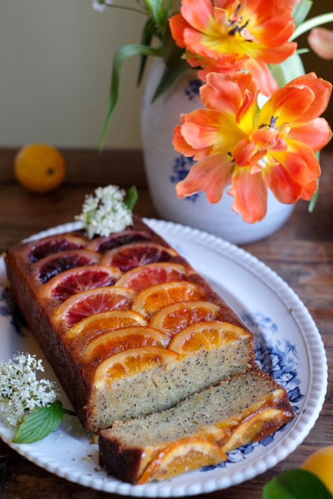 moist almond lemon upside cake loaf cake with ombre citrus slices