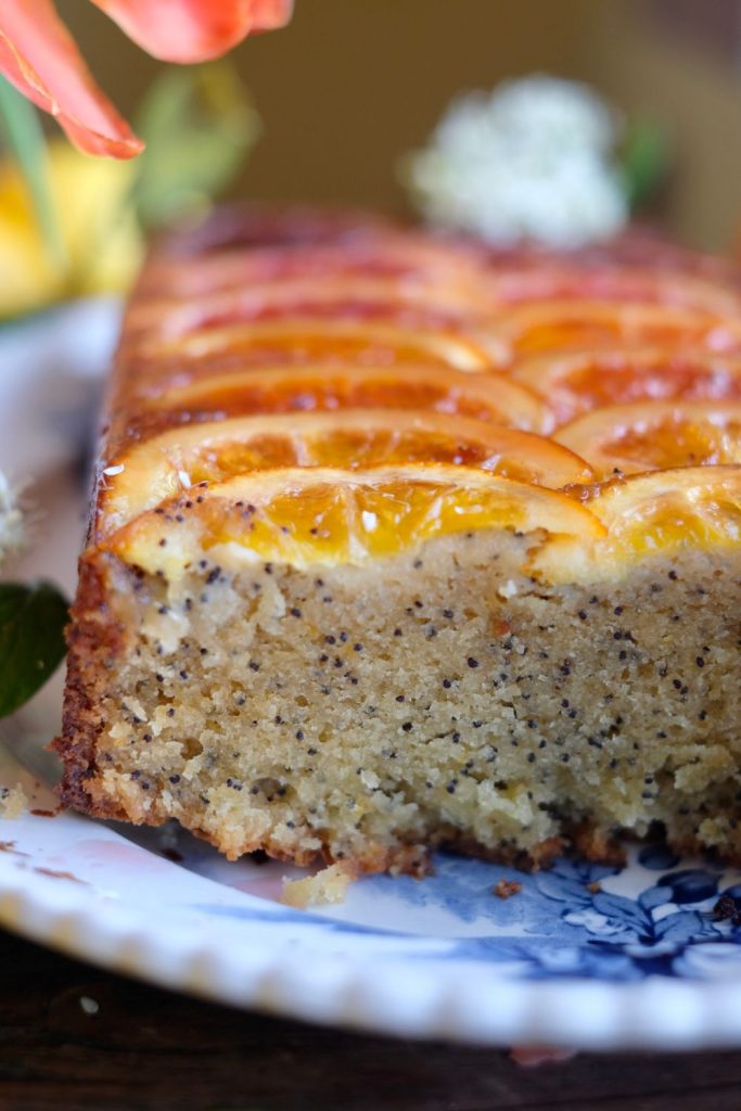 Moist almond lemon upside cake loaf cake with ombre citrus slices