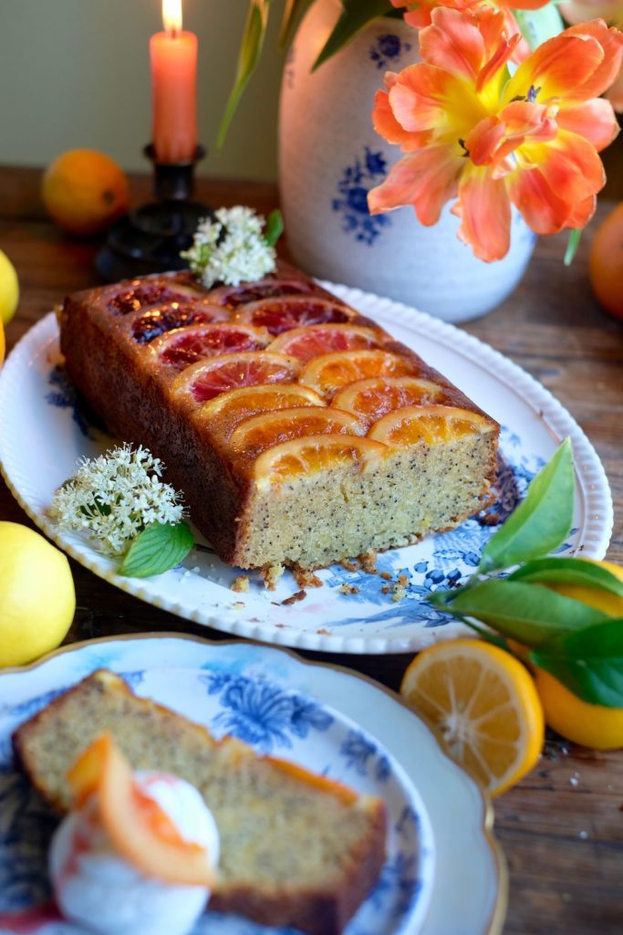 Moist almond lemon upside cake loaf cake with ombre citrus slices