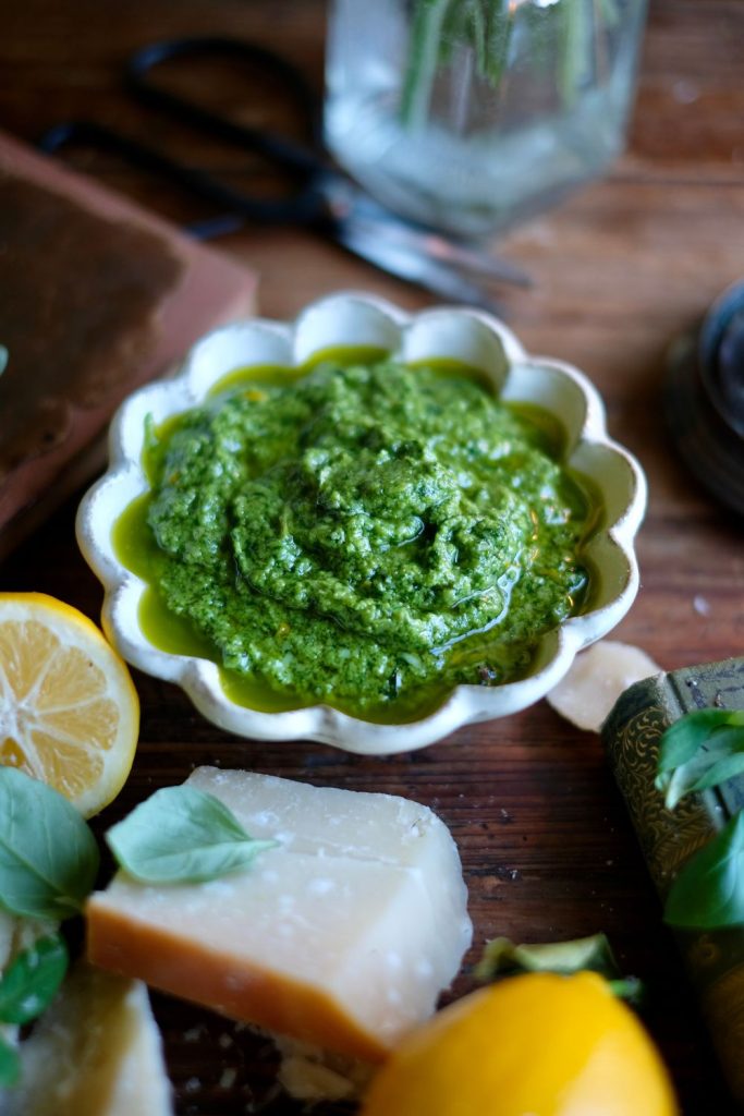 vibrant green basil pesto in a bowl