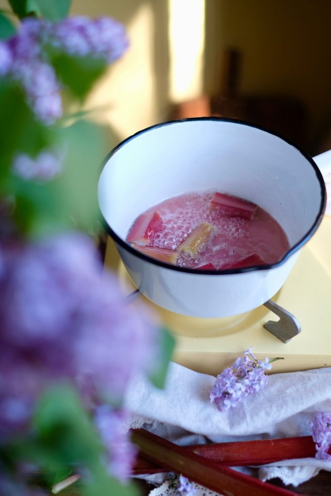 Poaching the rhubarb in a saucepan 