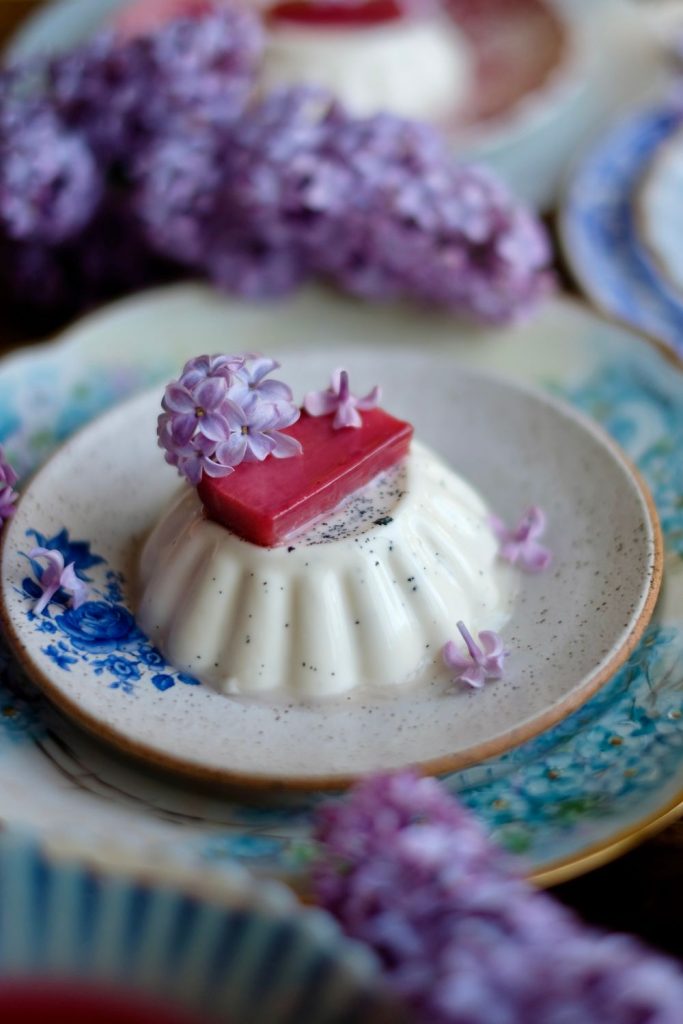 Lilac rhubarb panna cotta on a plate