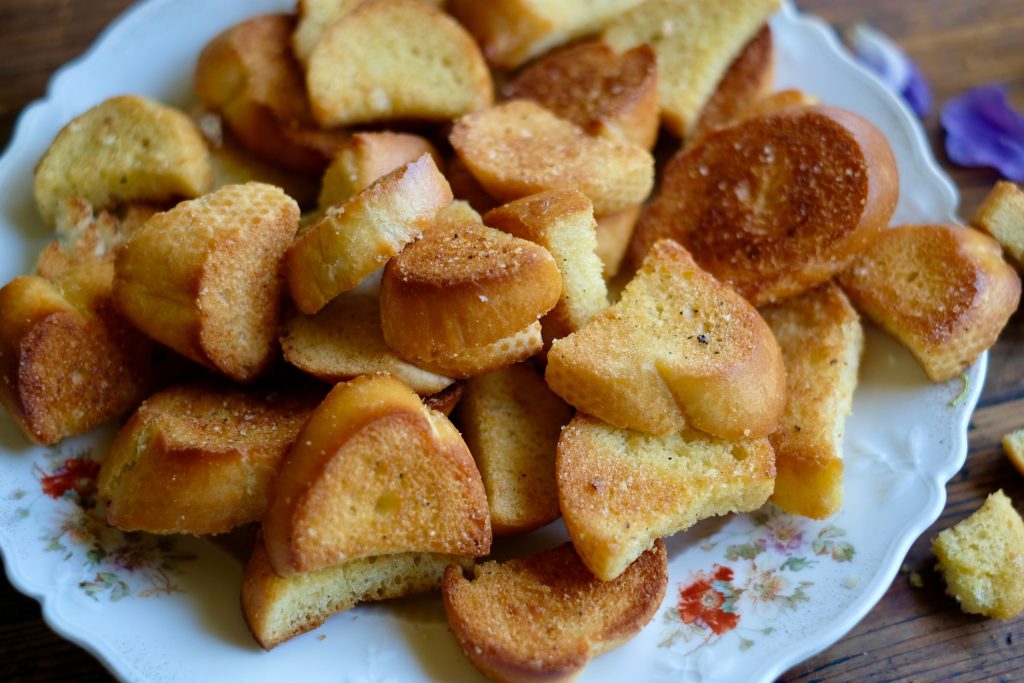 Homemade garlic croutons on a platter