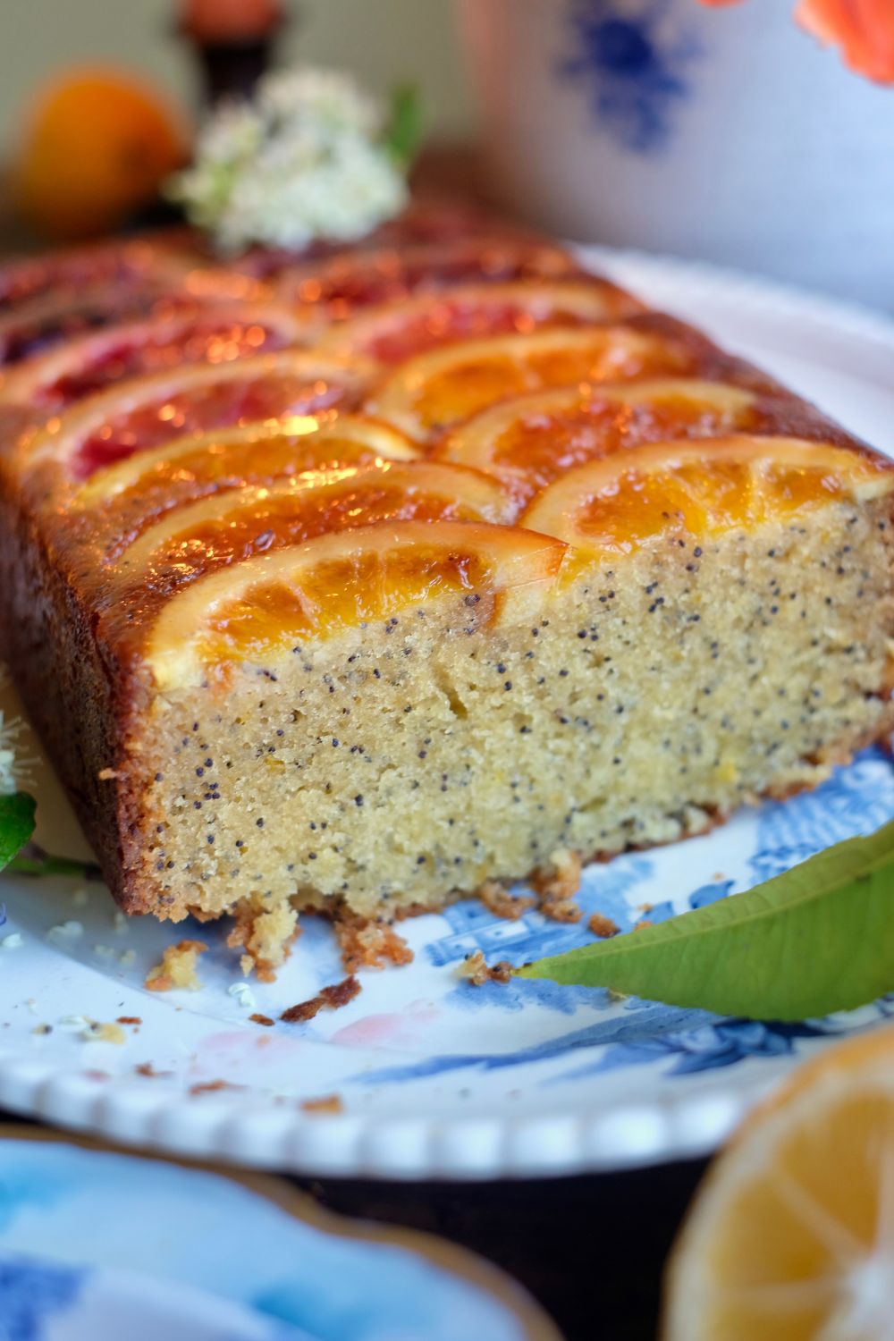 Moist almond lemon upside cake loaf cake with ombre citrus slices